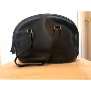 Vintage Coach leather “bowling bag.”